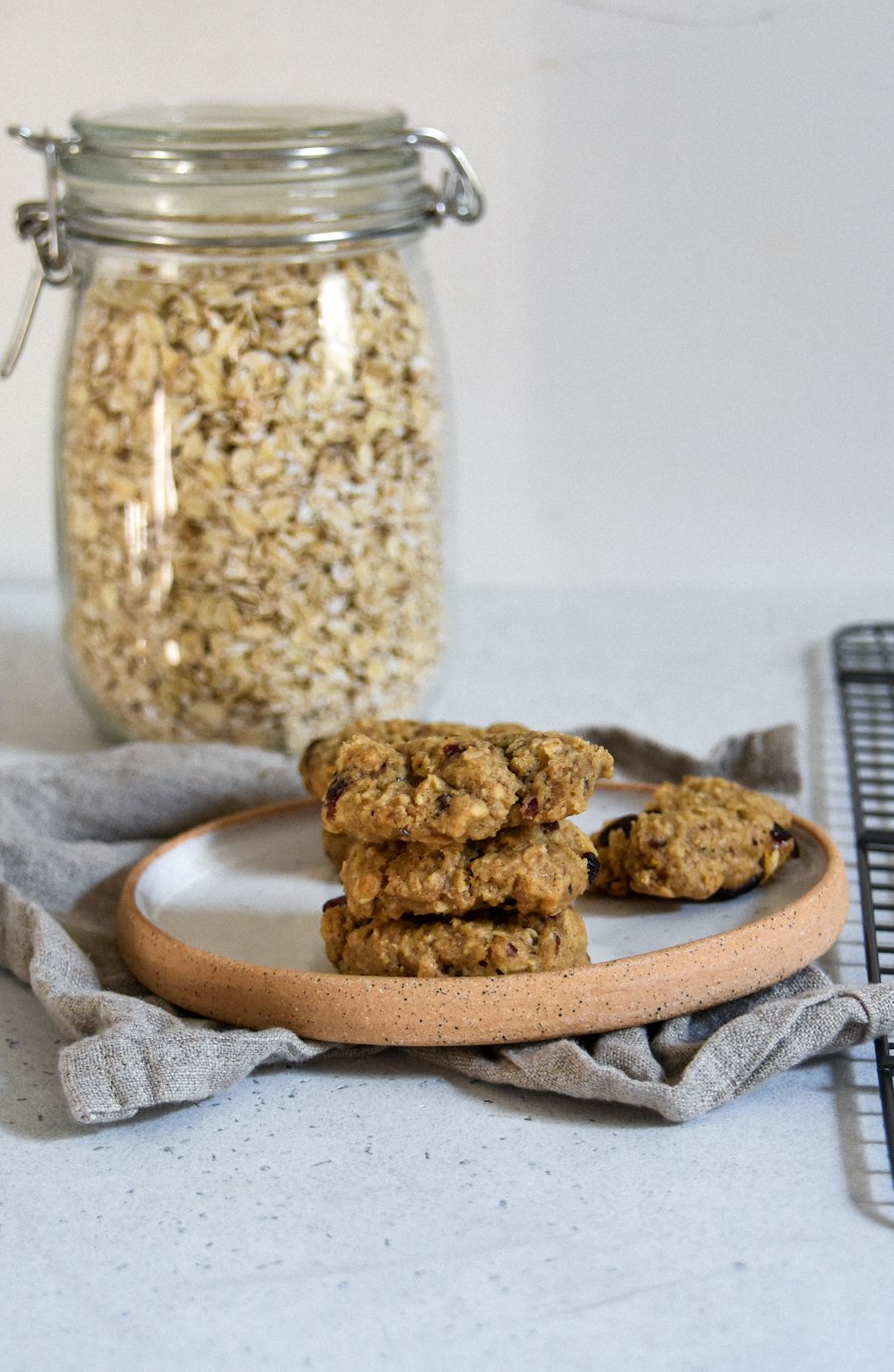 A stack of oatmeal cookies on a plate